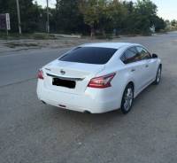 Эмблема багажника. Nissan Teana