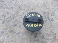 Крышка топливного бака. Toyota Nadia, SXN10