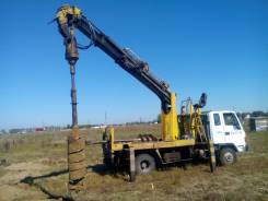 Isuzu Forward. Автобуровая (ямобур) , 6 495 куб. см., 3 000 кг.