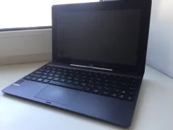Asus Transformer Book T100TA-DK003H. 10", 2 660����, ��� 2048 ��, ���� 64���, WiFi: 1, Bluetooth: 1, ����������� �� 5��. ����