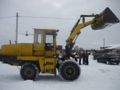 Ун - 053, 1990. Фронтальный погрузчик ун-053, 11 000 куб. см., 3 000 кг.