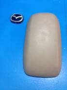 Подлокотник между сиденьями. Mazda Protege Mazda Familia, BJ3P, BJ5P, BJ5W, BJ8W, BJEP, BJFP, BJFW, BJ Mazda 323, BJ Двигатели: B3, B3ME, ZL, ZLDE, ZL...