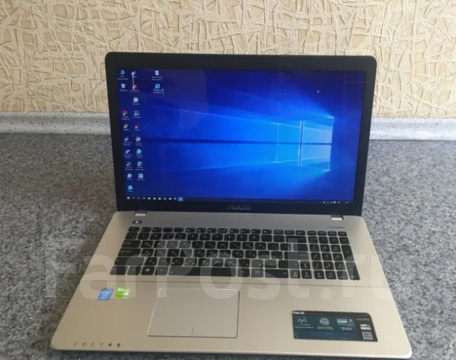 Asus K750JB. 17", 2 400����, ��� 8 ��, ���� 1 024���, WiFi: 1, Bluetooth: 1, ����������� �� 4��. ����