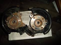 Кулак поворотный. Nissan Almera