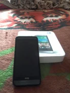 HTC One E8. �/�