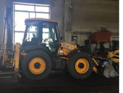 Услуги экскаватора погрузчика JCB в Прокопьевске с гидромолотом.