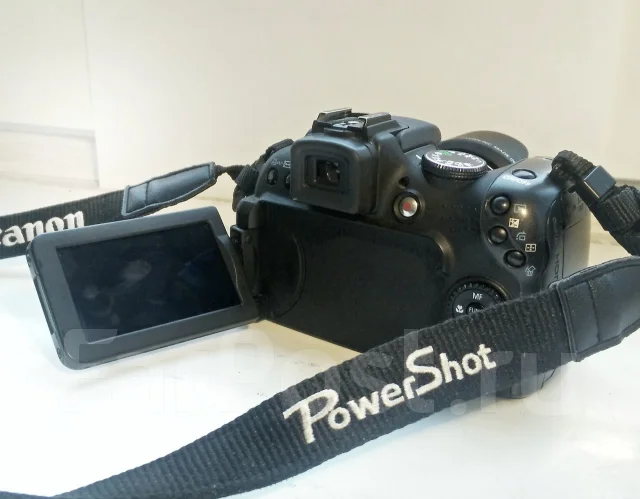 Canon PowerShot SX1 IS. 10 - 14.9 ��, ���: 14� � ����� ����