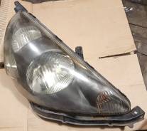 Фара. Honda Fit, GD2, GD1, DBA-GD2, UA-GD2, LA-GD1, DBA-GD1, LA-GD2, UA-GD1
