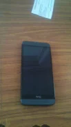HTC One E8. �/�