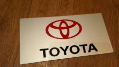 Табличка. Toyota Corolla, 16