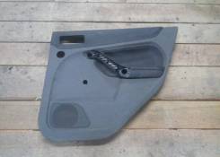 Обшивка двери. Ford Focus