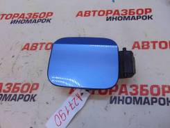 Лючок топливного бака Skoda Rapid
