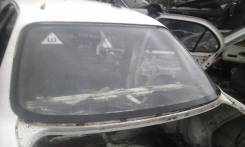 Стекло заднее Toyota Sprinter AE100