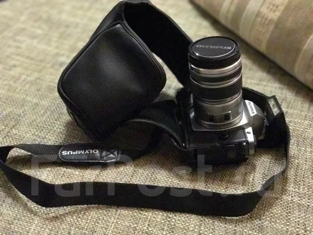 Olympus E-M5. 15 - 19.9 �� ����