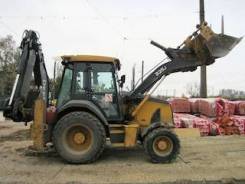 John Deere. Экскаватор-погрузчик JOHN Deere 325