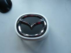 Эмблема. Mazda