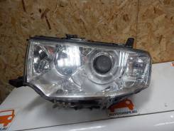 Фара Mitsubishi Pajero Sport, левая