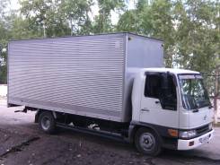 Грузовики.