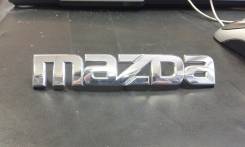 Эмблема. Mazda