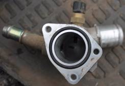 Корпус термостата. Kia: Ceed, Cerato, Venga, Pride, K3, Soul, Forte, Rio, Shuma, Carens Hyundai: i20, i30, ix20, Accent, Veloster, Elantra, Creta, Ava...