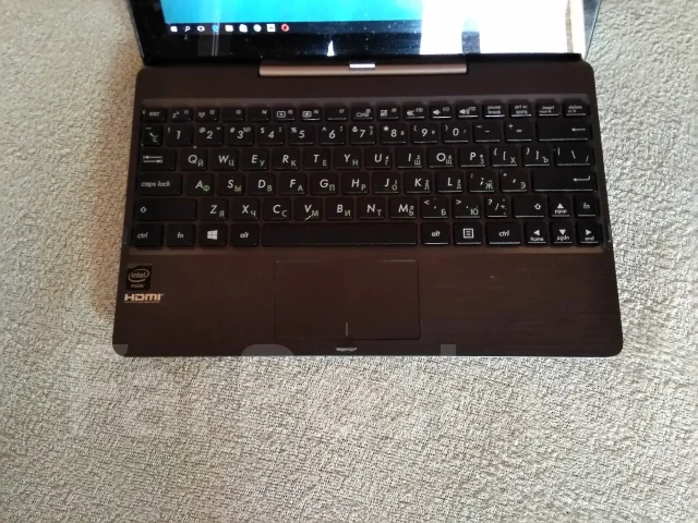 Asus Transformer Book T100TA. 10.1", 1,8����, ��� 2048 ��, ���� 32���, WiFi: 1, Bluetooth: 1, ����������� �� 5��. ����