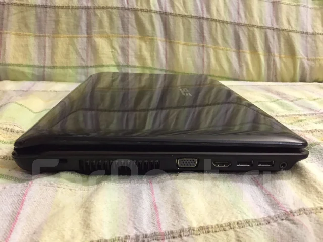Asus K42DR. 14", 2,3����, ��� 3072 ��, ���� 320���, WiFi: 1, Bluetooth: 1 ����