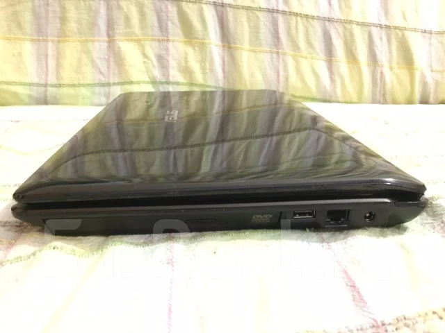 Asus K42DR. 14", 2,3����, ��� 3072 ��, ���� 320���, WiFi: 1, Bluetooth: 1 ����