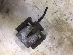 Суппорт тормозной. Toyota Corolla Verso, ZNR10, ZNR11, CUR10, AUR10 Toyota Avensis, ZZT251, AZT255, ADT251, AZT250, AZT251, ADT250, CDT250, ZZT250 Дви...