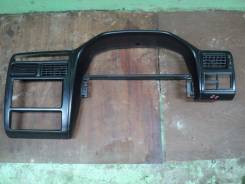 Консоль панели приборов. Toyota Corona, CT215, CT216, ST215, AT210, CT210, CT211 Toyota Carina, ST215, CT210, CT211, AT212, CT216, CT215 Двигатели: 3S...