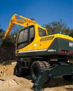 Hyundai R140W-9S. Ýêñêàâàòîð êîëåñíûé Hyundai R140W-9S (êîâø 0,58 êóá. ì. ), 100 êóá. ñì., 0,58 êóá. ì.