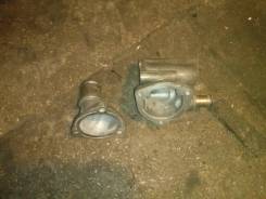 Корпус термостата. Nissan Cube, AZ10, ANZ10, Z10 Nissan March Box, AZ10, WAK11, WK11 Nissan Micra Nissan March, ANK11, HK11, FHK11, K11, AK11 Двигател...