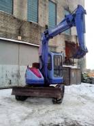 Komatsu PC75. Экскаватор -UU, 3 260 куб. см., 0,30 куб. м.