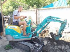 Kobelco SK007. Экскаватор мини с гидромолотом , 523 куб. см., 0,03 куб. м.