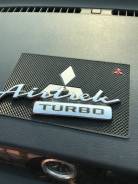 Эмблема. Mitsubishi Airtrek, CU2W