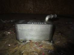 Радиатор масляный. Volkswagen Touran Volkswagen Passat Volkswagen Golf Volkswagen Jetta