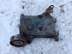 Крепление компрессора кондиционера. Nissan Almera, N16, N16E Двигатель QG15DE