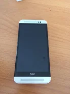 HTC One E8. �/�