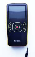 Kodak Zx1. Менее 4-х Мп, с объективом