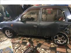 Nissan March. NK11, CG13