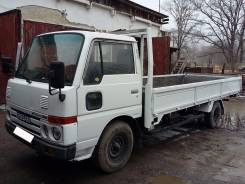 Nissan Atlas. , 3 500 куб. см., 2 000 кг.