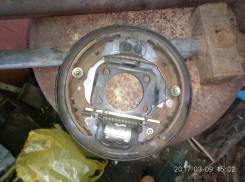 Кожух тормозного суппорта. Toyota Vitz, SCP10 Двигатель 1SZFE
