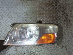 Фара (передняя) Mitsubishi Pajero 2000-2006, левая