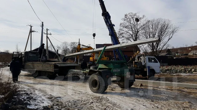 Бульдозер, монтаж дренажной системы, переливных колодцев во Владивостоке