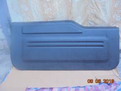 Обшивка двери. Mitsubishi Pajero, H65W, H66W, H67W, H76W, H77W Mitsubishi Pajero iO, H61W, H62W, H65W, H66W, H67W, H71W, H72W, H76W, H77W Mitsubishi M...
