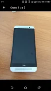 HTC One E8. �/�