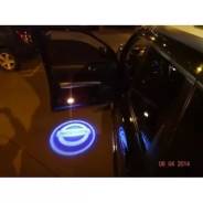 Подсветка в дверь с логотипом Ниссан. Эмблема Ниссан светящаяся. Nissan