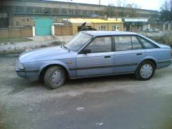 Замок двери. Mazda 626