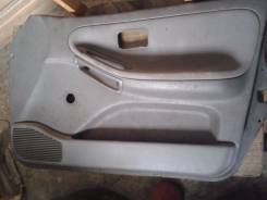 Обшивка двери. Nissan Sunny, B13