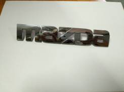 Эмблема. Mazda