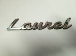 Эмблема. Nissan Laurel